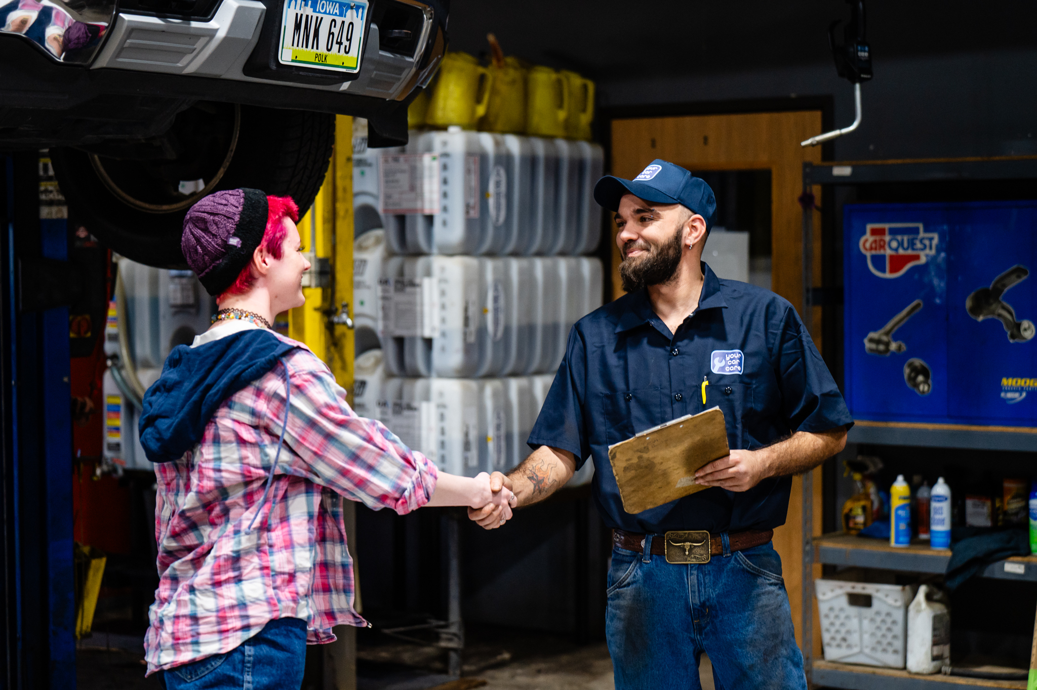 YCC technician shaking hands with a happy customer