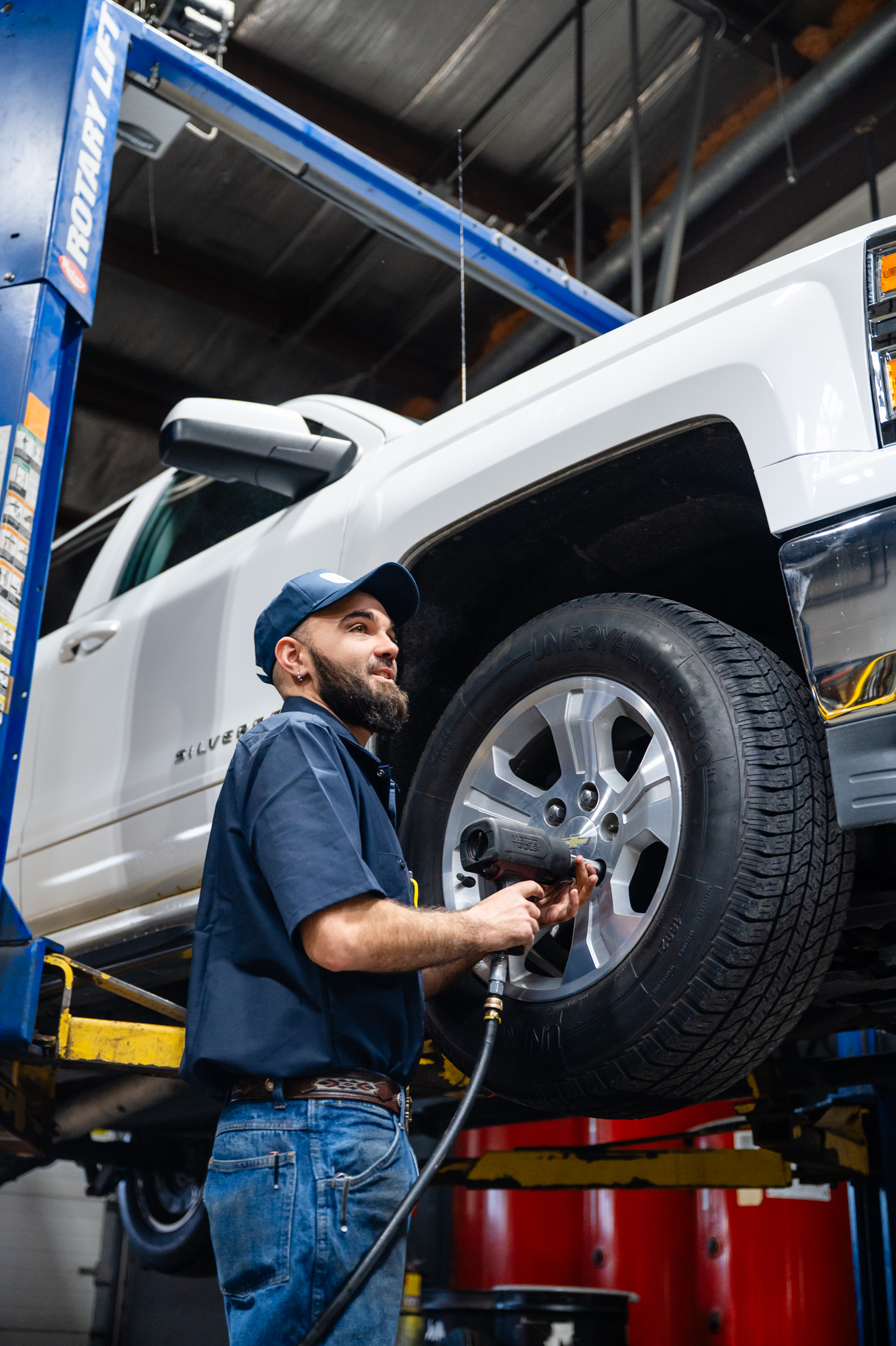 Des Moines technician at Your Car Care Tire and Auto performing tire services